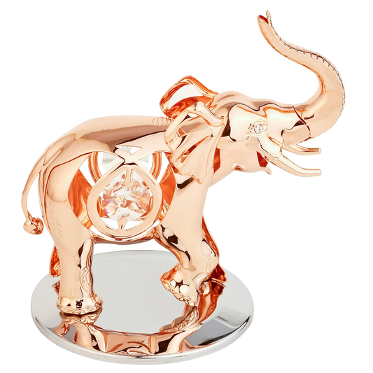 Rose gold elephant figurine with a clear gemstone on a white background