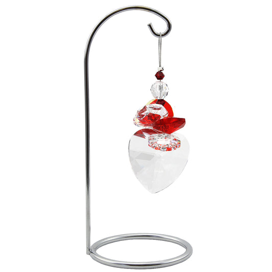 Crystal heart and red prism suncatcher on a stand